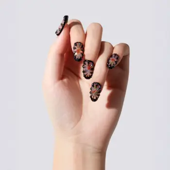 Chrome Thorn Handmade smoked blush 3D press-on nails with silver metallic thorn-like ridges and iridescent aurora flakes, worn on hand