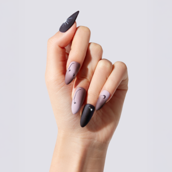 Mystic Tarot - Handmade matte black and dusty rose ombre almond press-on nails with white hand-painted sun, moon, and star motifs. | worn on hand 2 | So Does Nails