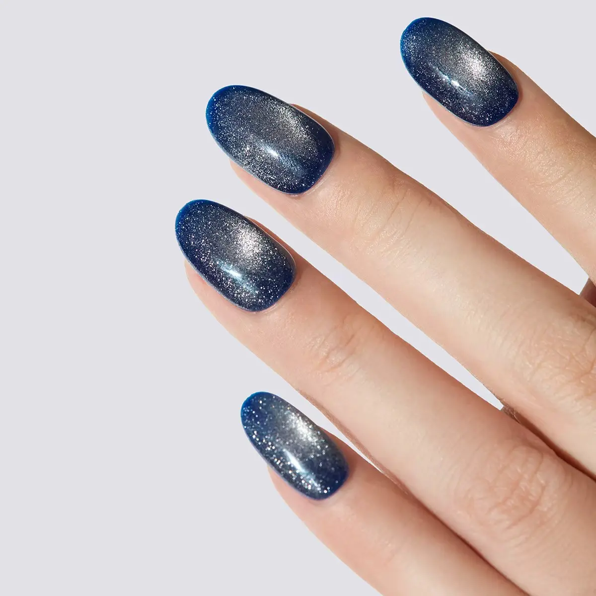 Blue Mirage - Handmade Blue Cat Eye Short Press on Nails | worn on hand 2 | So Does Nails