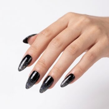 Black Aurora - Black almond press-on nails with holographic glitter gradient. | worn on hand 2 | So Does Nails