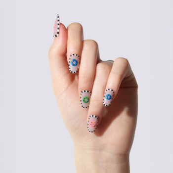 Donut Sprinkles - press-on nails with colorful hand-painted donuts and black polka dot borders | worn on hand 2 | So Does Nails
