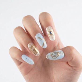 Dreamtime - Handmade almond press-on nails in white featuring gold celestial line art. | worn on hand 2 | So Does Nails