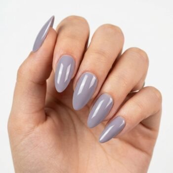 Fog Purple - Muted lavender purple press-on nails, medium almond shape, glossy finish. | worn on hand 2 | So Does Nails
