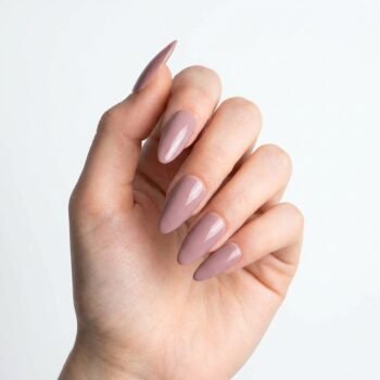Muted Silk - Dusty mauve press-on nails, medium almond shape, glossy finish. | worn on hand 2 | So Does Nails
