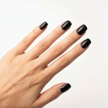 Power Tip - Solid glossy jet black short square press-on nails. | worn on hand 2 | So Does Nails