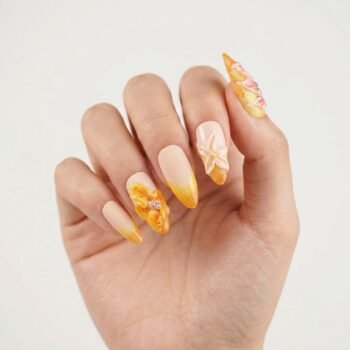 Tangerine Heat - Yellow-to-orange glitter gradient almond press-on nails with 3D floral sculptures. | worn on hand 2 | So Does Nails