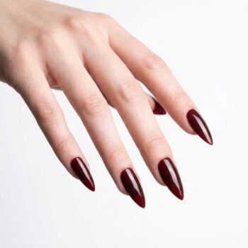 Wine Stain - Burgundy wine press-on nails, medium almond shape, glossy finish. | worn on hand 2 | So Does Nails